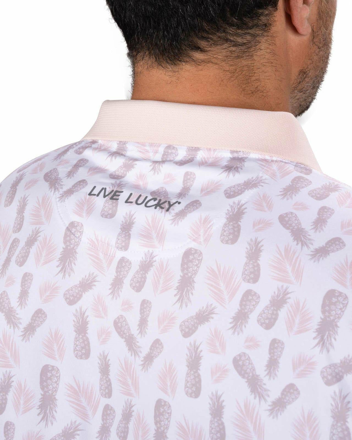Black Clover Tropical Men's Light Pink Golf Polo with Pineapple Pattern