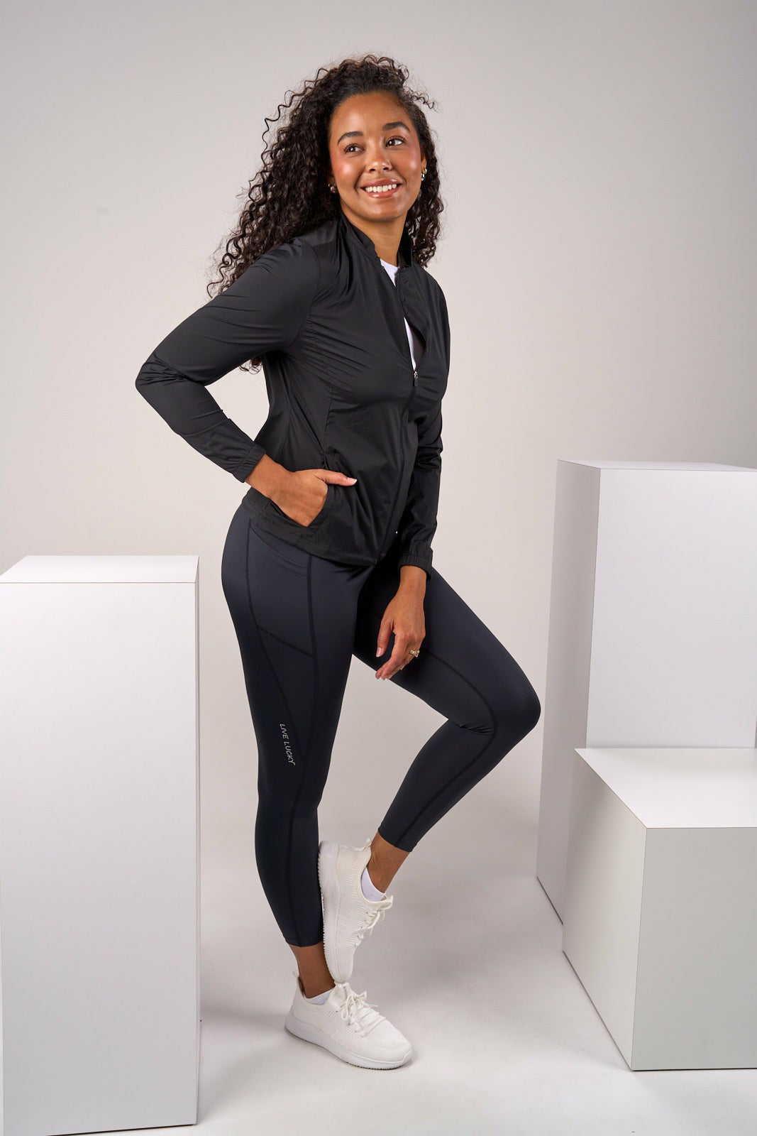 Black Clover Stylish Women's Windbreaker Rain Jacket in Black