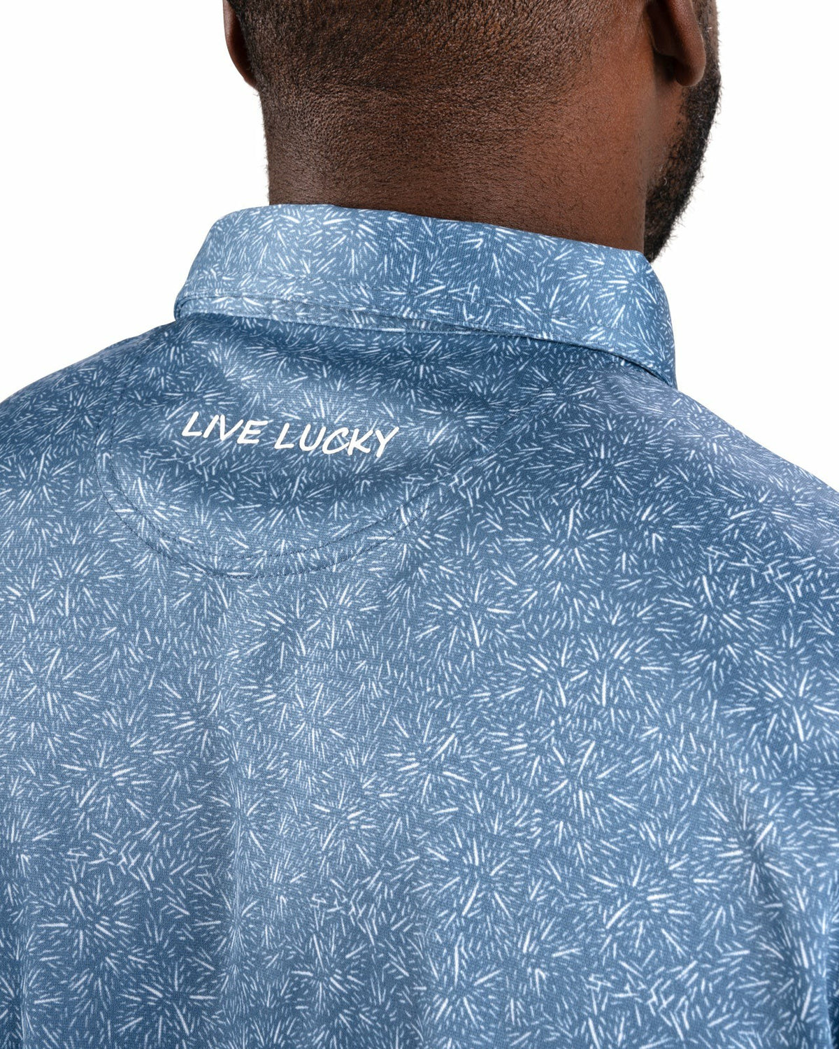 Black Clover Men's Patriotic Blue Golf Polo with Fireworks Pattern